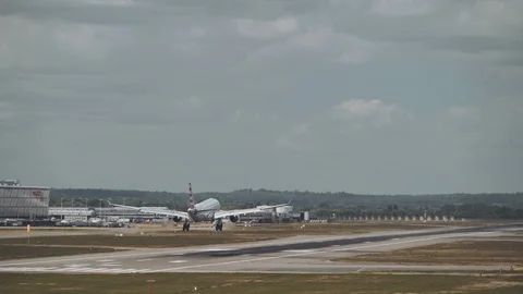 4k British Airways plane extreme close-up landing on runway 3 Stock Footage 112752153