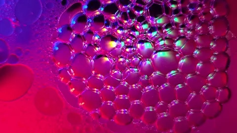 4k - Bubbles over colored lights Stock Footage 294802442