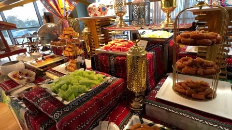 4K Buffet Display with Arabic Decor and Pastries. Stock Footage 304324302