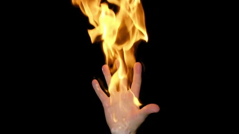 4K - Burning hand on black background. Fire flame at slow motion Video stock 302297839