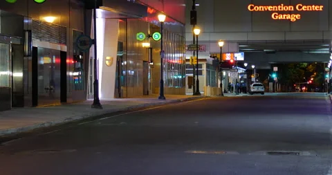 4K BUS DRIVING IN FRONT OF DESOLATE CONVENTION CENTER STREET Stock Footage 132602371