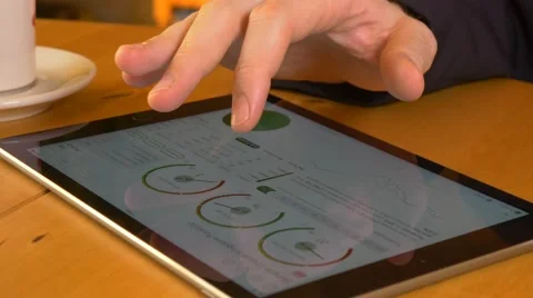 4k business man using tablet Ipad checking finances stock market businessman Stock Footage 57311230