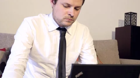 4k Business Man Working on Sofa - Dolly Shot Stock Footage 40326176