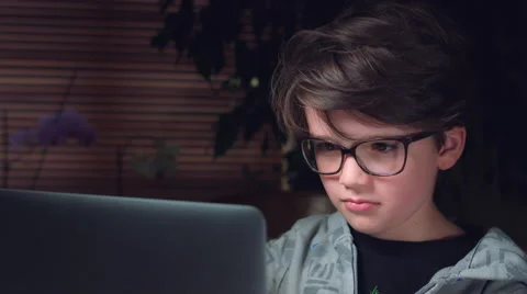 4K Business Shot of a Child Working on Computer and Studying Stock Footage