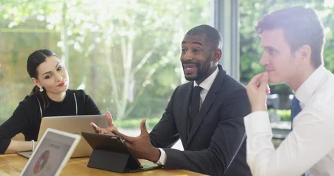 4K Business team analyzing data in a meeting &amp; discussing a serious problem Stock Footage 109391809