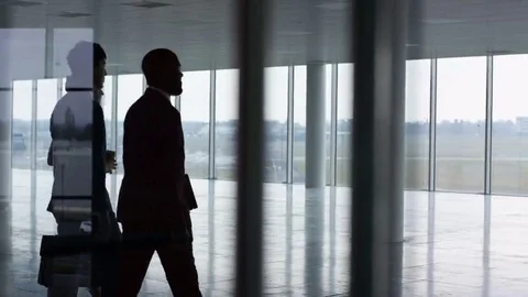 4K Business team viewing empty commercial property &amp; shaking hands with agents Stock Footage 69135192