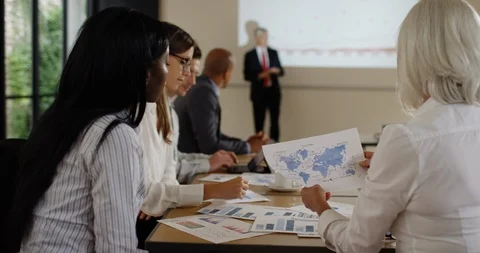 4K Business teamwork - corporate group discussing strategy to grow the business Stock Footage 101405730