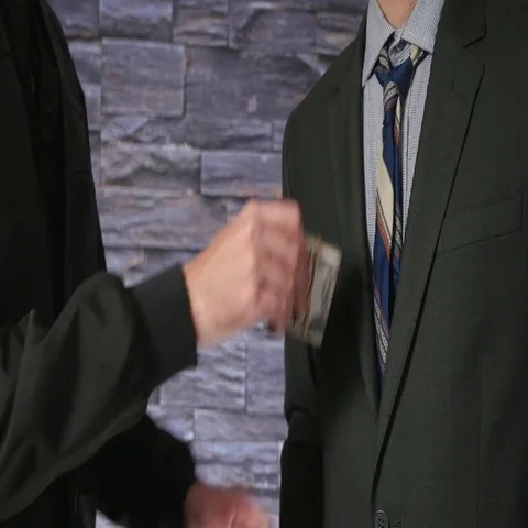 4K Businessman Getting Bribe Money in His Pocket Then Handshake - Corruption  Stock Footage