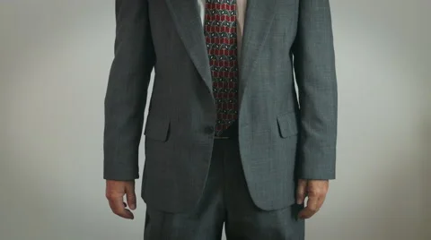 4K: Businessman Pulls Out Empty Pockets To Show No Money Stock Footage 54925770