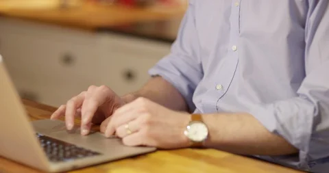 4k businessman using a laptop to work from home  Stock Footage 128394036