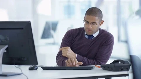 4K Businessman working on computer at his desk in modern office Stock Footage 72718931