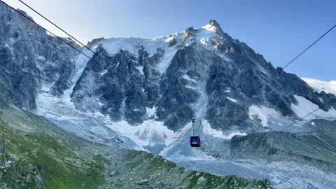 4K Cable car moving suspended on steel cables descending from higher station Stock-Footage 161714855