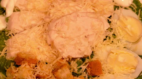 4k – Caesar salad on plate 01 Stock Footage 55616342