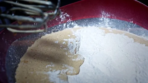 4K Cake Baker Adding Flour to Mixture Stock Footage