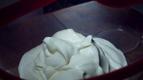 4K Cake Baker Adding Sour Cream for Mixture Stock Footage 74287185