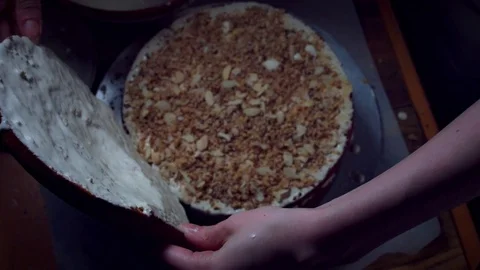 4K Cake Baker Building the Cake with Sponges and Cream Stock Footage 74288338