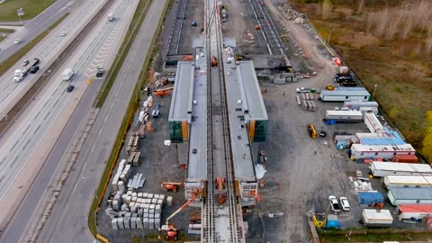4K camera drone, construction site of the Fairview REM Station in Montreal. 스톡 동영상 166064436