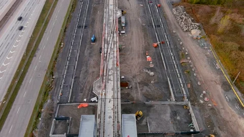 4K camera drone, construction site of the Fairview REM Station in Montreal. 動画素材 166102229