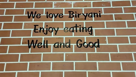 4K Camera footage Brick wall with fun food themed message Stock Footage 325649706