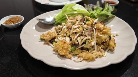 4K Camera footage Crispy mushroom salad served with fresh greens 스톡 동영상 325649650