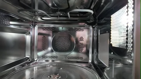 4K Camera footage Inside view of clean stainless steel oven Stock Footage 325650266