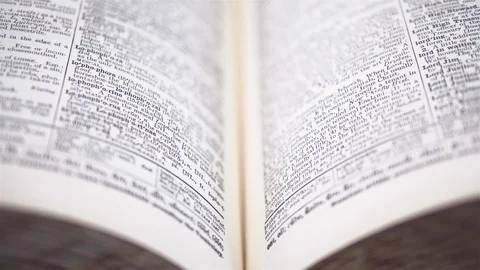 4K - Camera moves above the dictionary. Close-up Stock-Footage 119229597