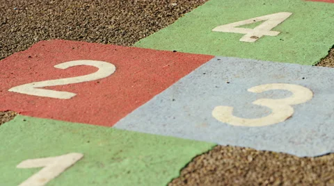 4K Camera moves across numbered squares in a playground, shot on Red Epic Dragon Stock Footage 55160338
