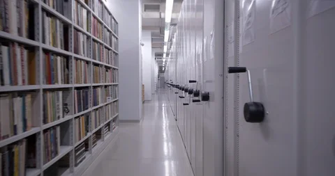 4K - Camera moves around the book storage Stock Footage 119083317