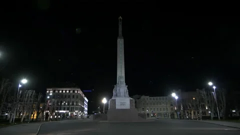 4K - Camera moves around the Freedom Monument in Latvia at night Stock Footage 132013422