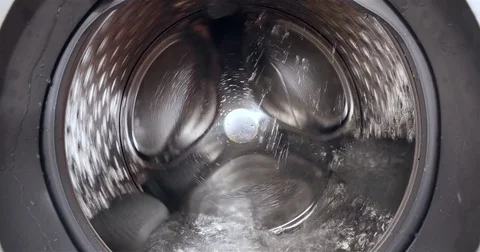 4K - Camera moves to inside the washing machine Stock Footage 83094868