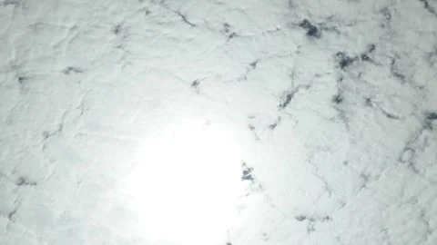 4K Camera video of bright cloudy sky with sunlight burst Stock Footage 325720445