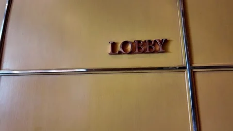 4K Camera video of hotel lobby sign on wall Stock Footage 325720555