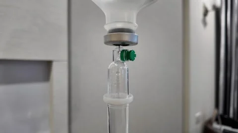 4K Camera video of IV drip in hospital setting Stock Footage 325720523