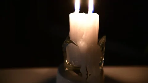 4k The candle is burning, on the table lies a notebook with verses Stock Footage 156758180