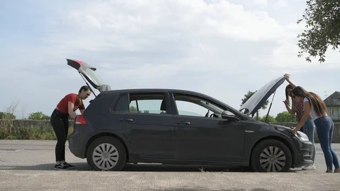 "4K car broke down and girls stuck in the middle of nowhere" Stock Footage 90801800