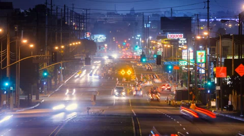 4K. Car traffic on night streets of Los Angeles city. Timelapse. Stock Footage