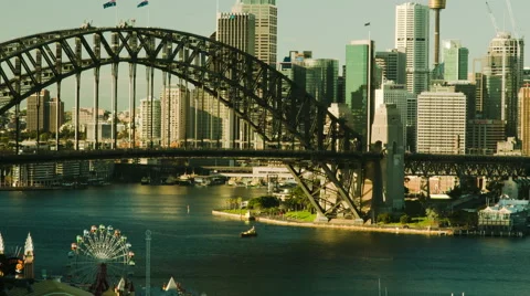 4K Cargo ship passes under Sydney Harbour Bridge tilt Stock Footage 58568784