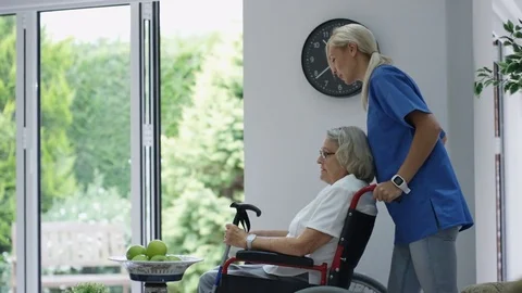 4K Caring nurse taking care of elderly residents in a nursing home Video stock 73068653