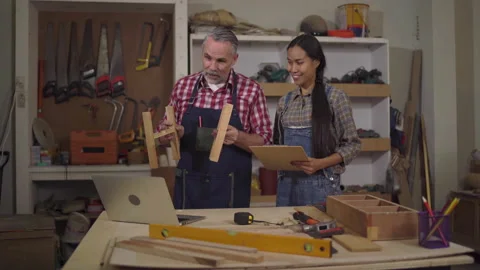 4K Carpenter couples are talking to customers online or over the phone. The.. Stock Footage 235583941