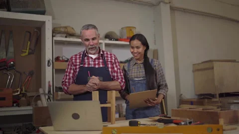 4K Carpenter couples are talking to customers online or over the phone. The.. Stock Footage 235584049