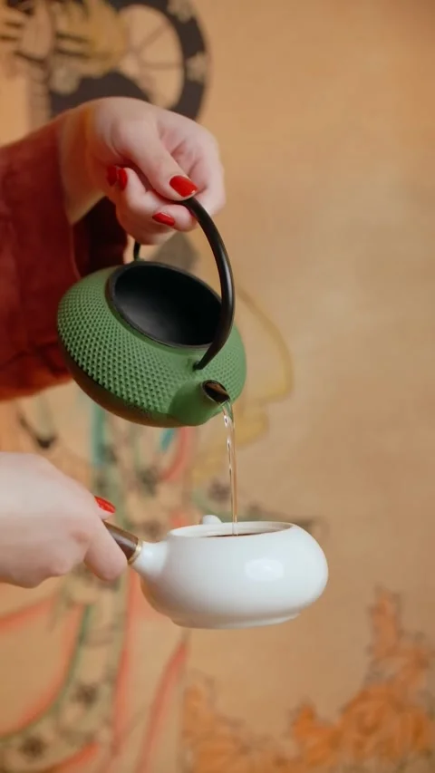 4K Cast Iron Teapot Tetsubin Stainless Steel Infuser Ceramic Lining 動画素材 339268024