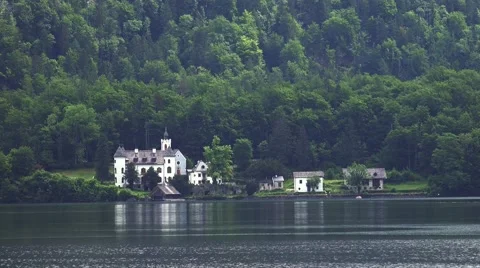 4k Castle at mountain forest lake Hallstatt in Austria Stock Footage 51397011