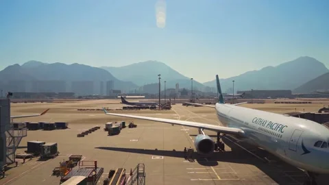 4k, a Cathay Pacific plane is at the terminal, Chek Lap Kok Airport, Hong Kong Stock Footage 165251970