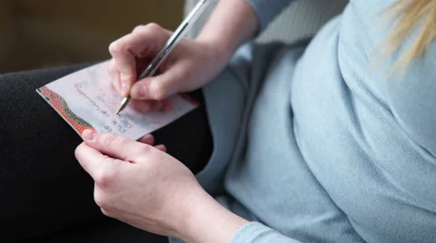 4k caucasian hands write shopping list with biro and coloured paper Stock Footage 61325498