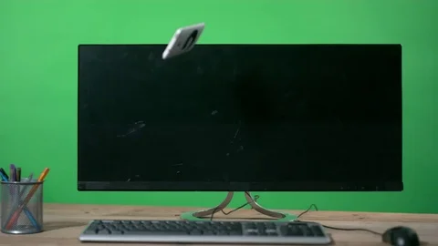 4K Cell phone thrown at computer screen in a rage, shot in super slow motion Video stock 77012075