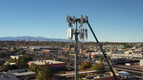 4k, cell tower, cellular, drone video, far off one person Stock Footage 147913261