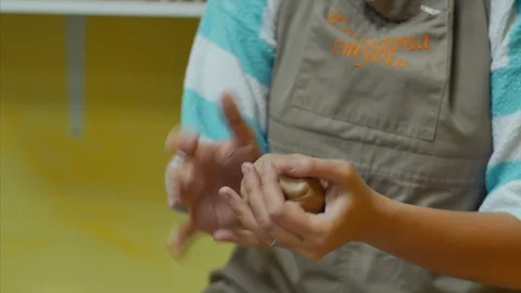 4K Ceramics - Wedging Rolling Clay Stock-Footage 102404671