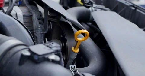 4K Checking Car Oil Close Up Engine Health and Maintenance Stock Footage 131688195