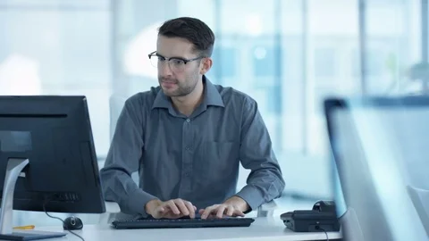 4K Cheerful businessman working on computer in modern office Stock Footage 72718882