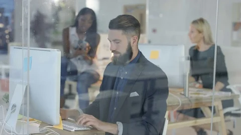 4K Cheerful creative design team working together in modern office Stock Footage 69768571